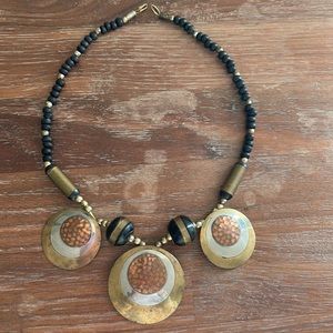 Mid century modern brass and black bead necklace.